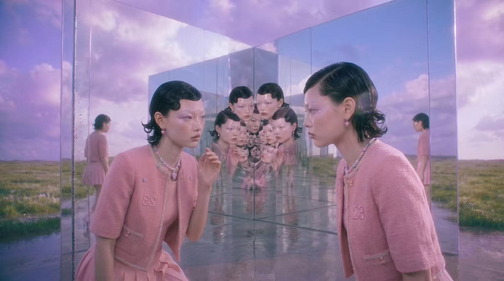 Mirrored reflections multiplying a model's face and body