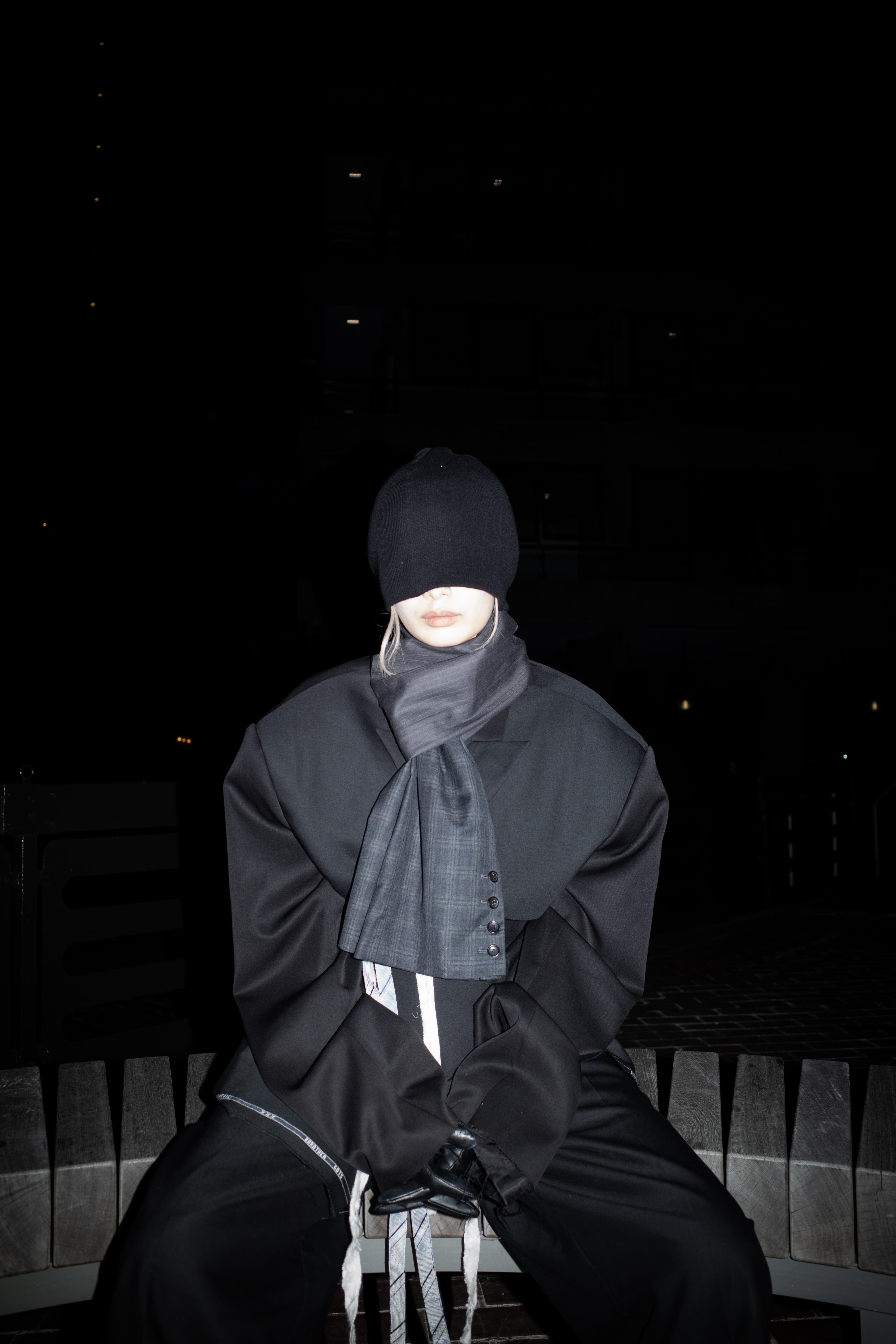 Invisible Armour seated at night